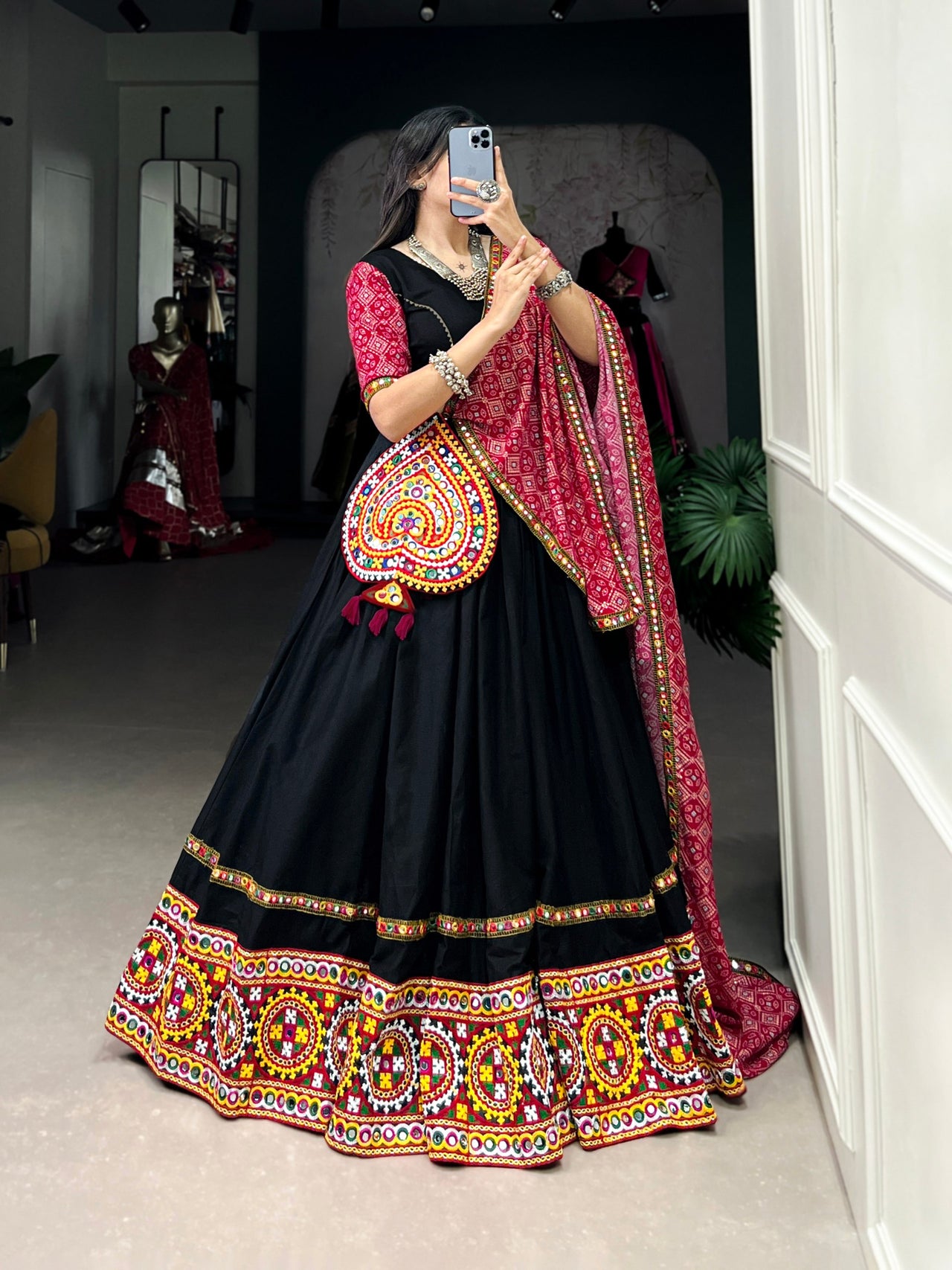 Orange and black Navratri Special Designer Lehenga Choli With Printed Butter Silk Material & pasted Mirror. Express shipping UK, offers US, Canada