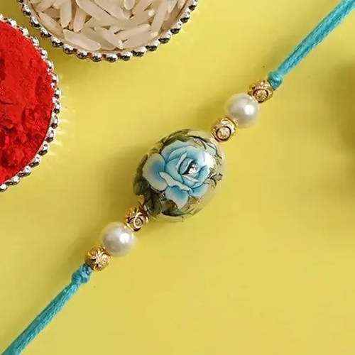 Rose Japanese Stone Rakhi & Kaju Rolls Box online in usa