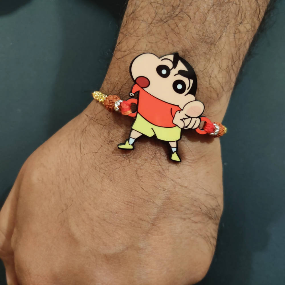 Shin-chan tattoo on the forearm.