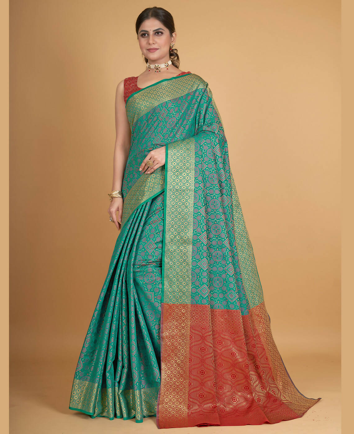 Sage green fancy tussar saree with floral vine design on its body, contrast  border & plain pallu